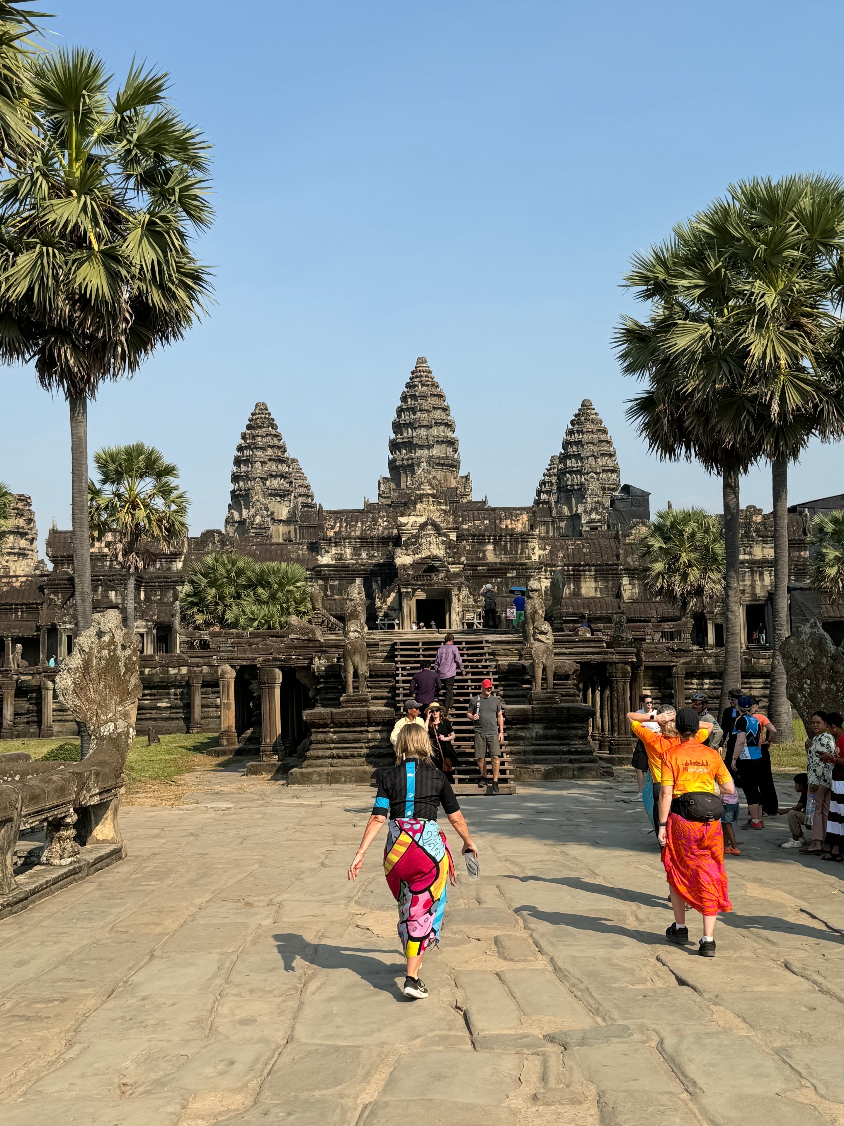 Ho Chi Minh to Angkor Wat — tourists approaching Angkor Wat temple Cambodia