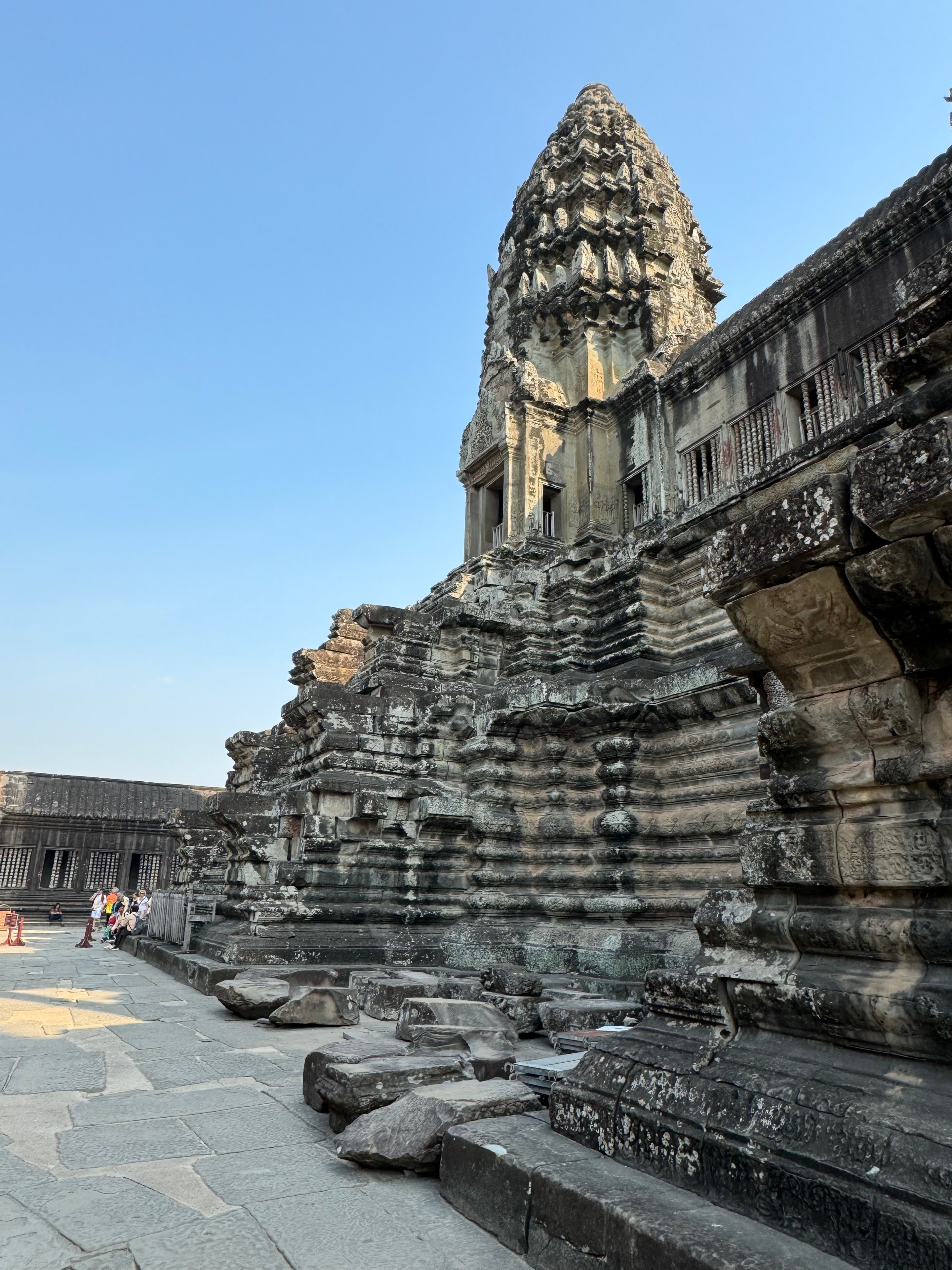 Ho Chi Minh to Angkor Wat — Angkor Wat tower detail ancient Khmer stonework